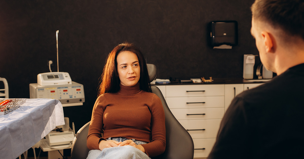 Woman talking to her surgeon she found from plastic surgery digital marketing efforts
