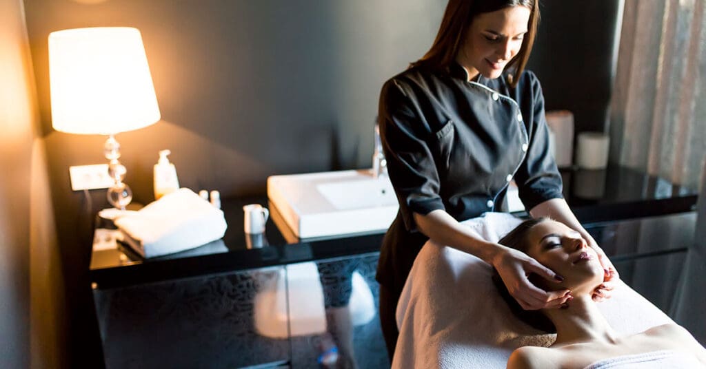 A woman working on a patient that came in from aesthetic marketing efforts