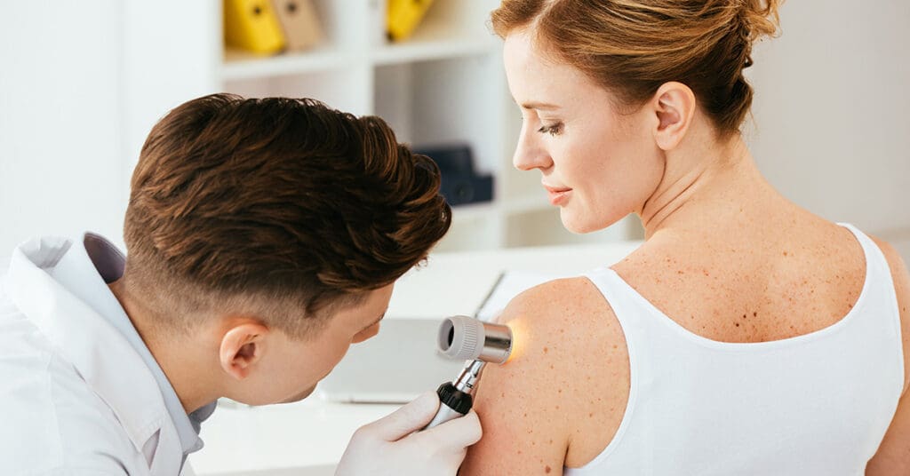 Patient with doctor due to the efforts of dermatology marketing